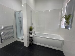 Shower, hair dryer, towels, soap