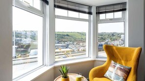 A corner room with three large windows overlooking a town. - HipNautic, Mevagissey, sleeps 6 (Mevagissey)