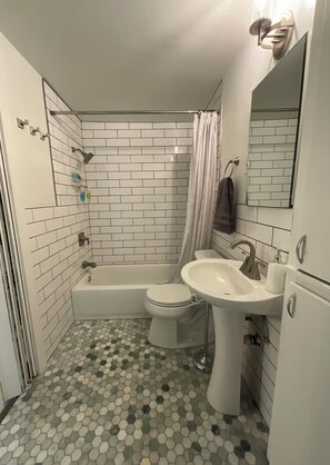Shower, towels, soap, shampoo