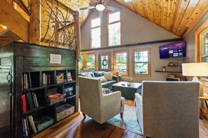 Smart TV, fireplace, foosball, books