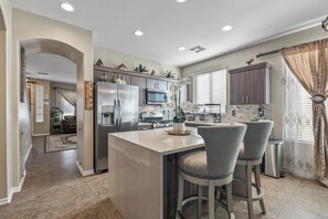 Fridge, microwave, oven, stovetop - Spacious 4-bedroom house in delightful Surprise with WiFi, AC close to downtown (Surprise)