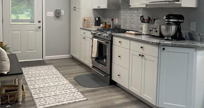 Cottage lake house nestled east of Mill Creek Park in Marshall IL