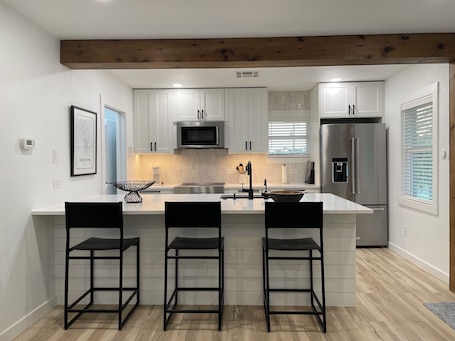 Fridge, microwave, oven, stovetop. Modern Garage Apartment in the Heart of Downtown Georgetown