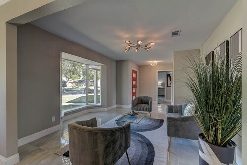 Modern home with pool, games, sauna, massage chair and huge lot!