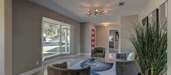 Modern home with pool, games, sauna, massage chair and huge lot!