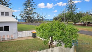 Property grounds - Highset one street back from the beach (Woodgate)