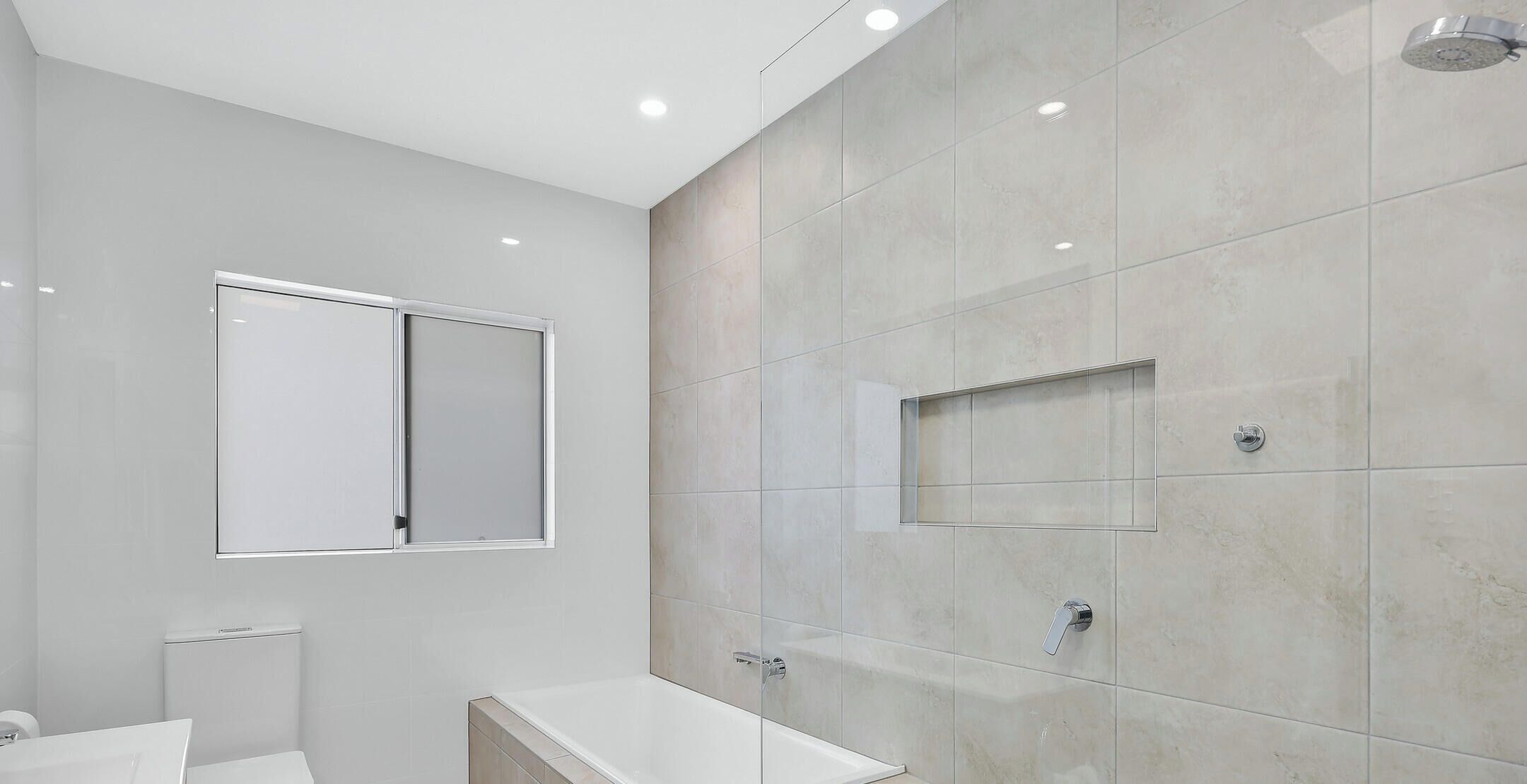 Shower, towels, toilet paper