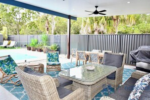 Outdoor dining - Modern Comfort with a Pool (WOODGATE)