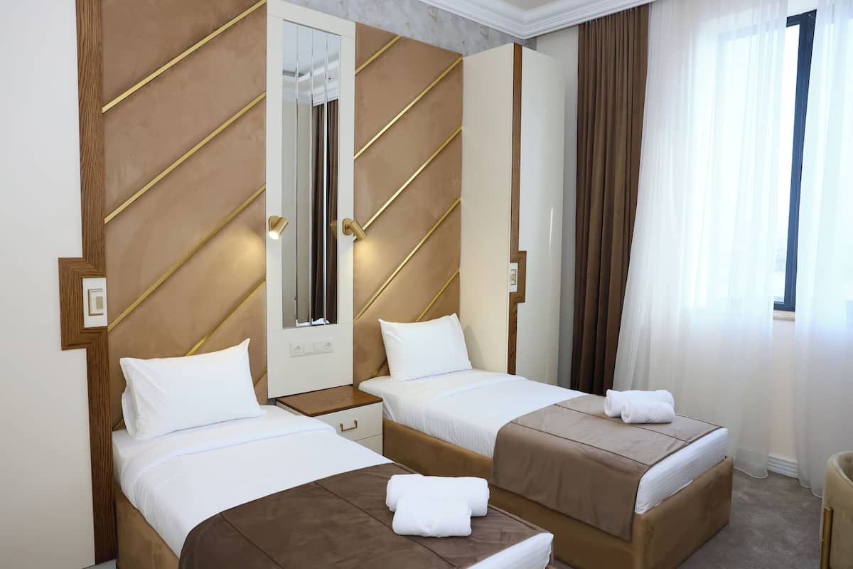 Comfort İki Ayrı Yataklı Oda, 2 Tek Kişilik Yatak | Ses yalıtımı, ütü/ütü masası, ücretsiz kablosuz İnternet