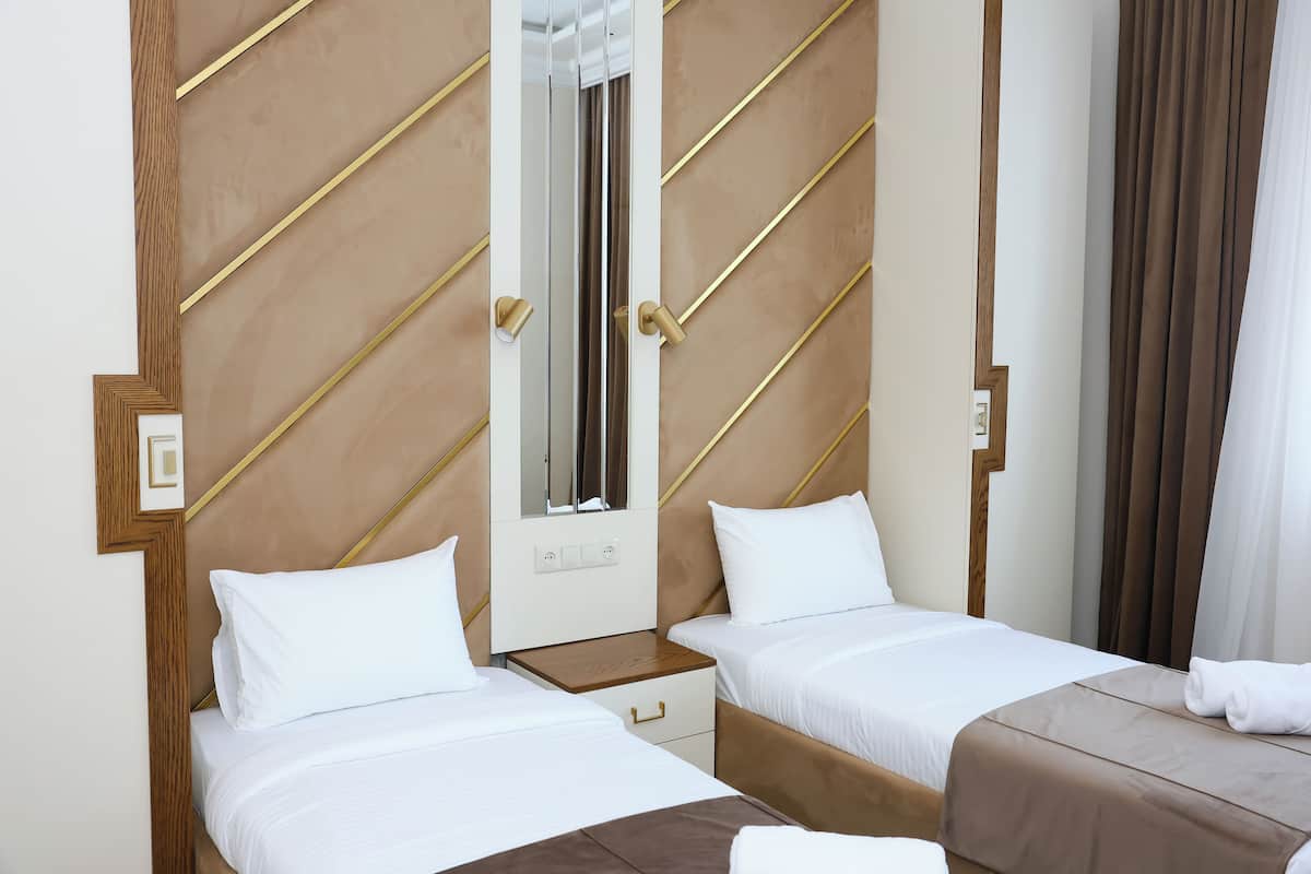 Comfort İki Ayrı Yataklı Oda, 2 Tek Kişilik Yatak | Ses yalıtımı, ütü/ütü masası, ücretsiz kablosuz İnternet