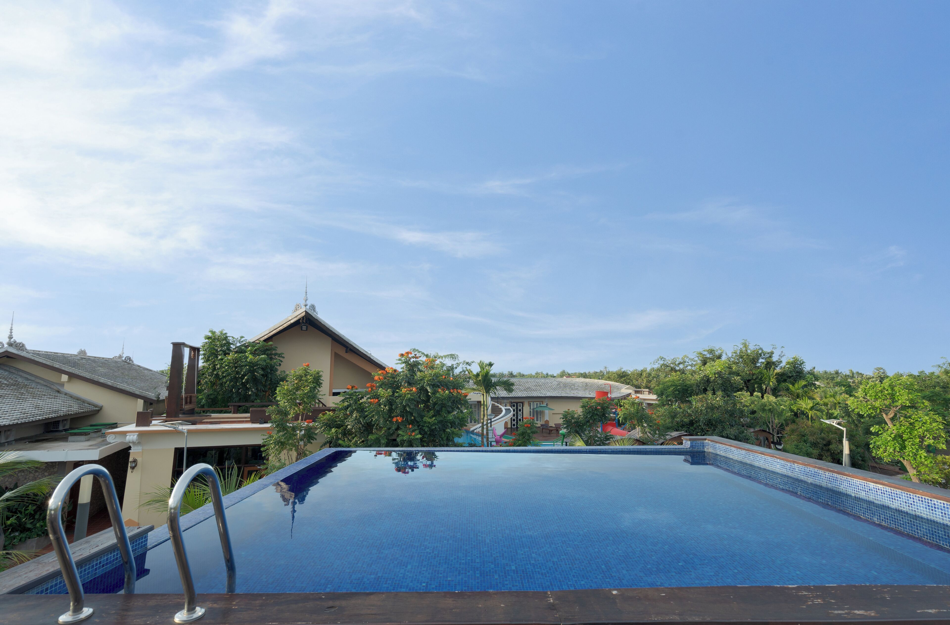 2 outdoor pools, pool umbrellas, pool loungers