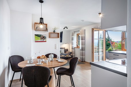 Dining. Apartment 'Sonnenblick' with Garden/Mountain View, Private Terrace and Shared Garden