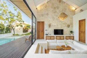 Design Villa, Patio, Pool View | Living area | Flat-screen TV, Netflix, streaming services - Villa Capture (Pecatu)