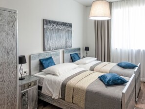 4 habitaciones, tabla de planchar con plancha y wifi 