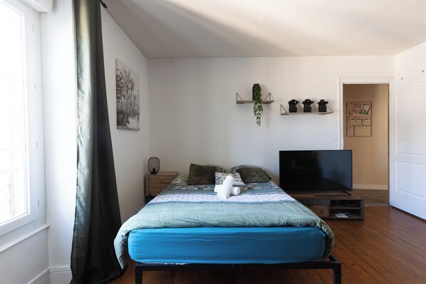 Apartament familiar | 1 dormitori, habitacions insonoritzades i planxa i posts de planxar