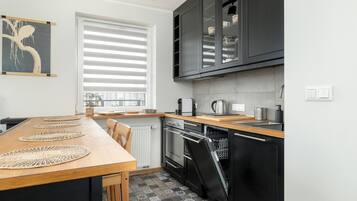 Dishwasher, coffee/tea maker, highchair, cookware/dishes/utensils