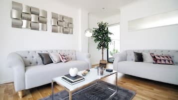Deluxe Apartment, Balcony, City View | Living area | 39-inch flat-screen TV with digital channels, TV, Netflix