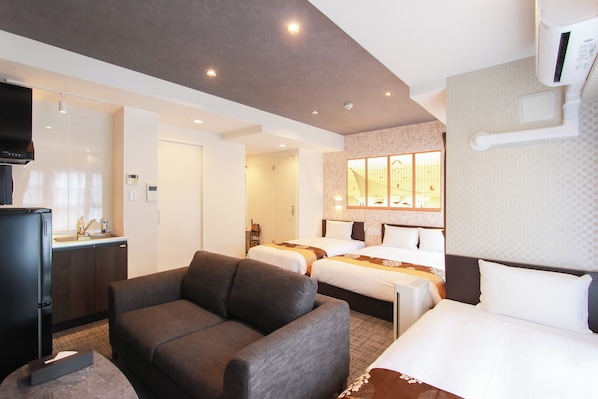 Chambre Quadruple Supérieure | 1 chambre, Wi-Fi gratuit, draps fournis