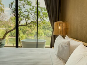 Deluxe Double Room, Non Smoking, River View | In-room safe, laptop workspace, blackout drapes, free WiFi