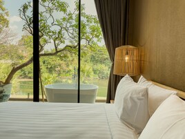 Deluxe Double Room, Non Smoking, River View | In-room safe, laptop workspace, blackout drapes, free WiFi