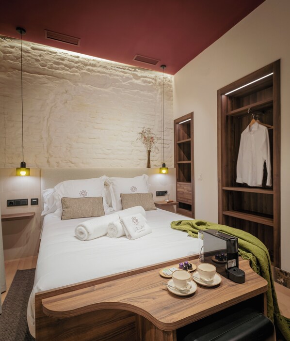 Quarto casal superior | Edredons de pluma, camas com colchões de espuma com sistema de memória