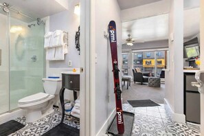 Shower, hair dryer, towels, shampoo