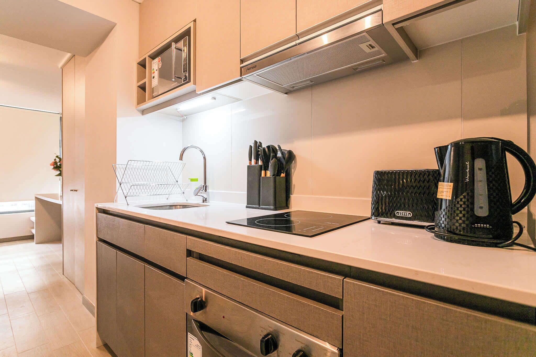 Coffee/tea maker, fridge, microwave, oven