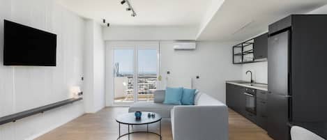 Deluxe-Apartment, 1 Doppelbett, Balkon | Wohnbereich