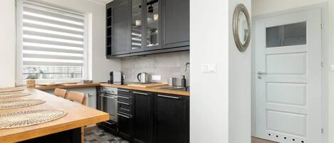 Kylskåp, ugn, spishäll och diskmaskin