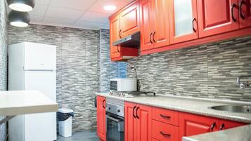 Apartment | Private kitchen | Fridge, microwave, oven, stovetop