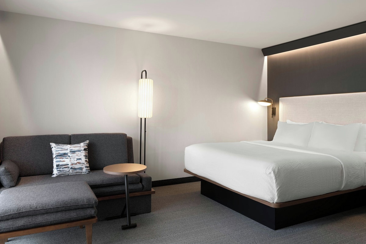 Premium bedding, blackout curtains, iron/ironing board