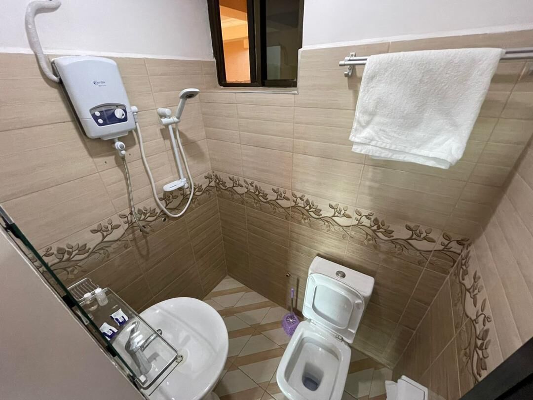 Shower, towels, soap, shampoo