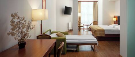 Chambre Deluxe, coin cuisine | Coffres-forts dans les chambres, bureau