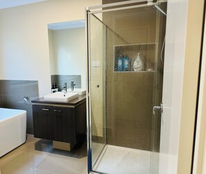 Shower, towels, soap, shampoo
