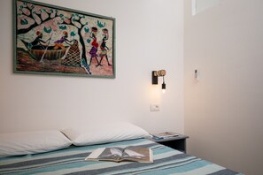 1 chambre, fer et planche Ă repasser, draps fournis