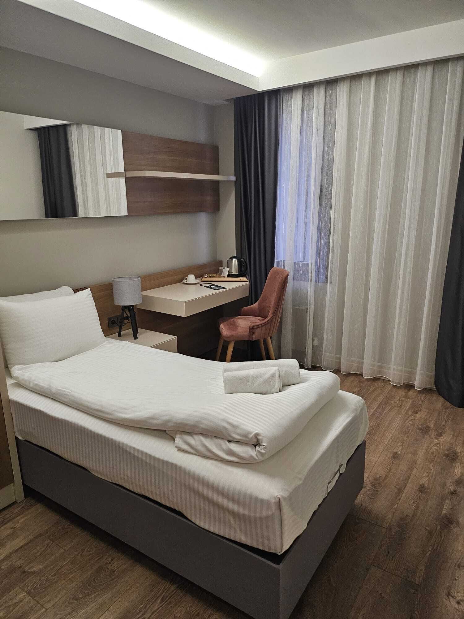 Laptop workspace, free WiFi, bed sheets