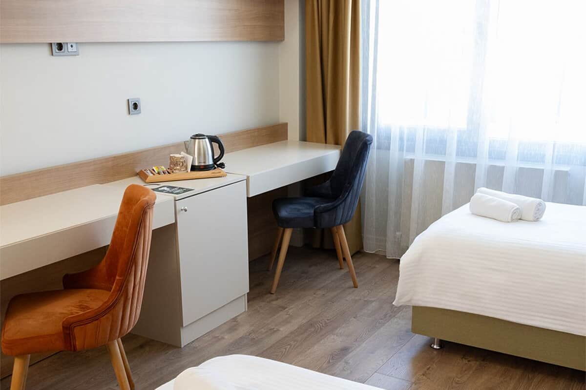 Desk, laptop workspace, free WiFi, bed sheets