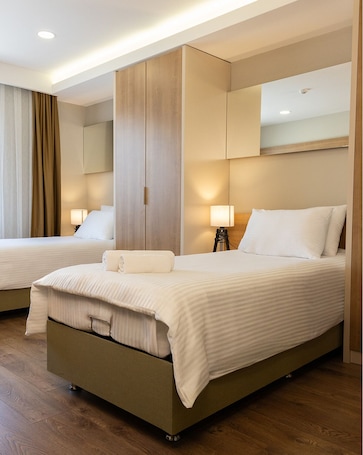 Desk, laptop workspace, free WiFi, bed sheets