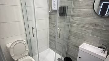 Shower, towels, soap, shampoo