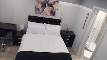 1 bedroom, desk, iron/ironing board, bed sheets