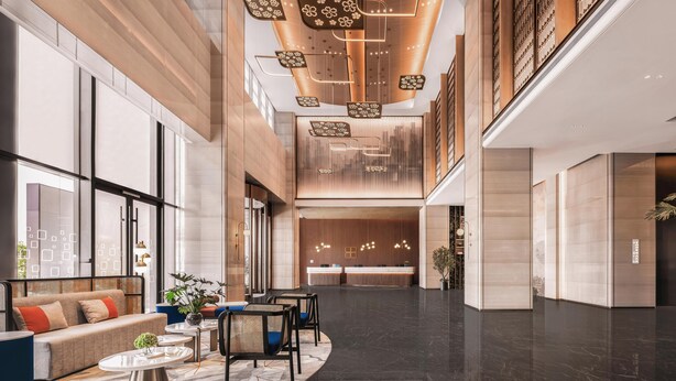 A spacious lobby with a reception desk, seating area, and large windows. - Hilton Garden Inn Fenyang Yulongwan (Lvliang)
