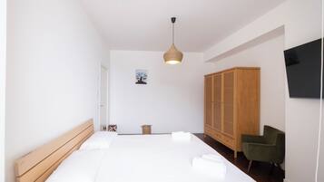 Deluxe Apartment, Balcony, Sea View | 1 bedroom, laptop workspace, blackout drapes, iron/ironing board