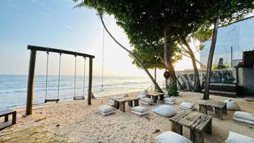 On the beach, beach towels