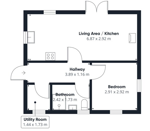 Plano de planta con sala de estar/cocina (6.87 x 2.92 m), un pasillo (3.89 x 1.16 m), un dormitorio (2.91 x 2.92 m), un baño (2.42 x 1.73 m) y un cuarto de servicio (1.44 x 1.73 m).