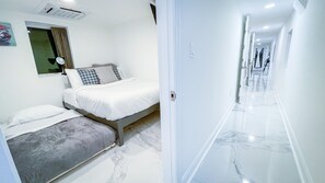 4 bedrooms, desk, iron/ironing board, travel cot