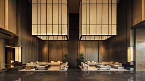 A spacious lobby with a central seating area, large windows with blinds, and a modern design. - Doubletree By Hilton Kaifeng (Kaifeng)