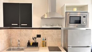 Classic Apartment, Balcony, Sea View | Private kitchen - IG - Villa Don Antonio  Apartment  (Giardini Naxos)