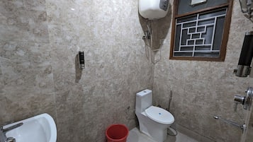Classic Double Room, Balcony, City View | Bathroom | Shower, slippers, towels, soap