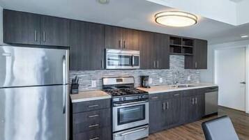 Coffee/tea maker, fridge, microwave, oven