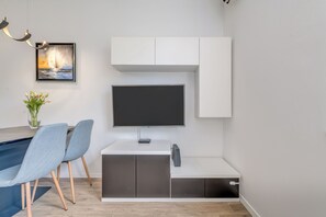 Lägenhet Deluxe | 1 sovrum, mörkläggningsgardiner, ljudisolering och strykjärn/strykbräda